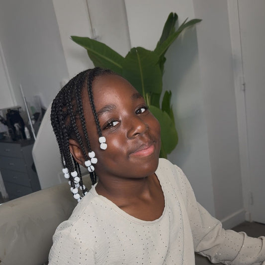Prestations enfants : soin et douceur pour les cheveux texturés des plus jeunes